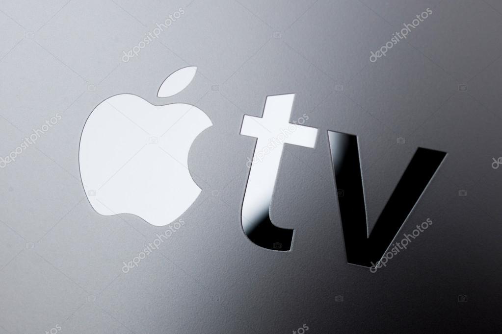 PARIS, FRANCE - NOV 10, 2015: Apple logo on the new Apple TV media streaming  player microconsole by Apple Computers featuring a new touch remote swipe-to-select with integrated Siri and motion senso