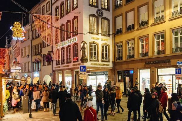People walking on the main street during Christmas Market — Stock Fotó