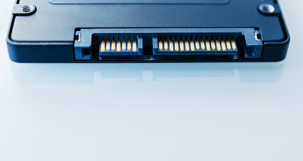 SSD disk drive SATA 6 connection  in blue technological backgrou