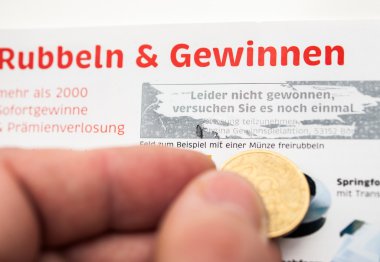 German lottery ticket scratching 