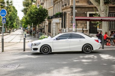 Luxury Mercedes-Benz limousine decorated for wedding