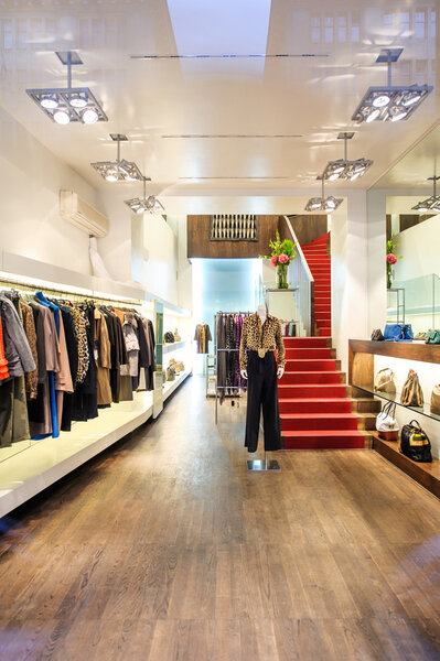 Interior of a boutique store with fashionable luxury women dress