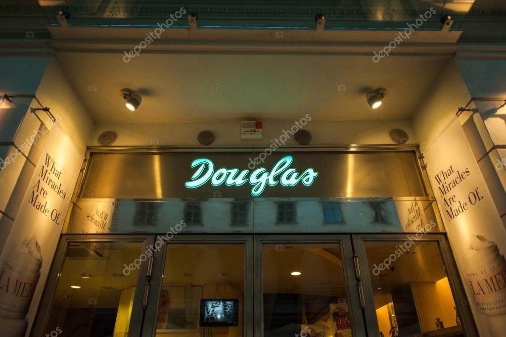VIENNA, AUSTRIA - JULY 4, 2011: Douglas beauty and fragrance store at night. Douglas Holding AG is a German perfume, book, jewelry and confection retailer based in Hagen. Douglas owns more than 1,900 stores, more than 1,500 of which are in Germany, i