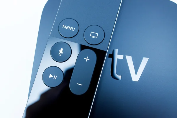 Siri remote over New Apple TV console — Φωτογραφία Αρχείου