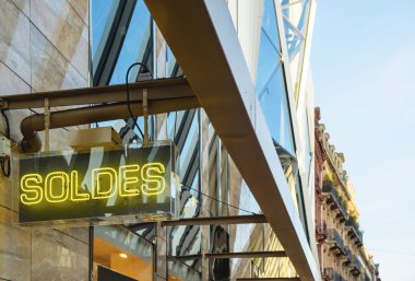 Neon sign with word SOLDES transalted as SALES 