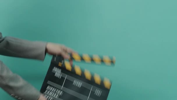 Movie Slate Clapperboard Hitting Business Woman Holding Empty Film Slate — Stock Video