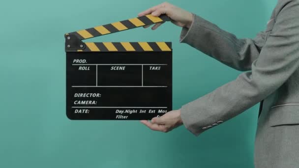 Movie Slate Clapperboard Hitting Business Woman Holding Empty Film Slate — Stock Video