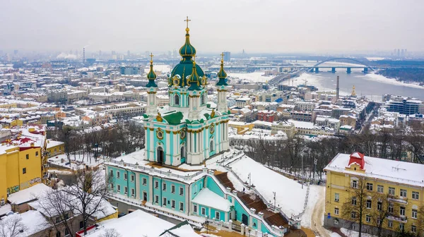St. Andrews Church and Andriyivskyy Descent, in winter, Kyiv, Ukraine Stock Photo
