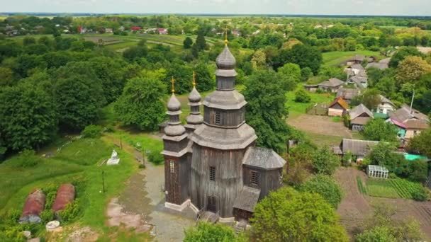 Rural landscape flying around the old wooden church. — Stock Video