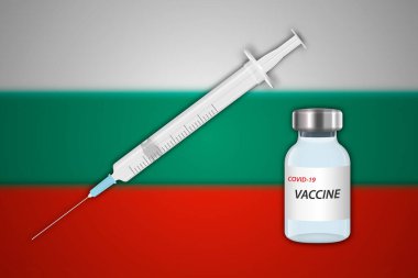 Bulgaristan bayrağı ve aşı pankartıyla bulanık arkaplandaki şırınga ve aşı şişesi