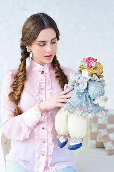 Woman with vintage doll — Stock Photo, Image
