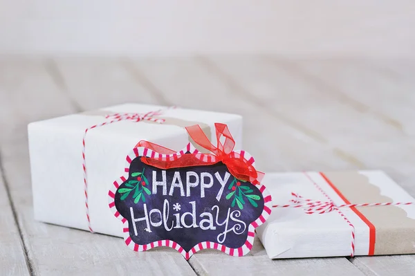 Still life with Happy Holidays sign — Stock Photo, Image