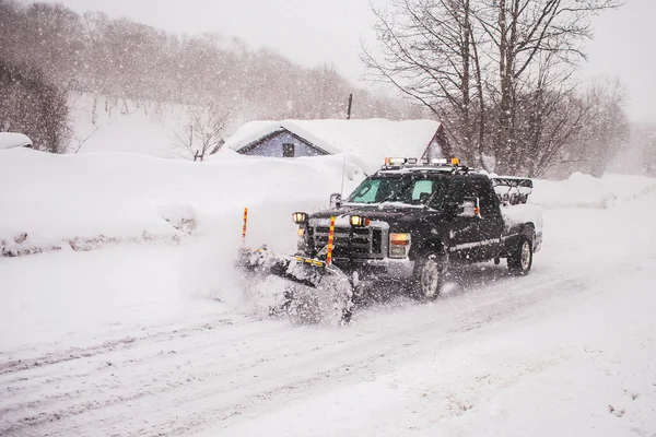 The vehicle for clearing roads of snow Stock Photo