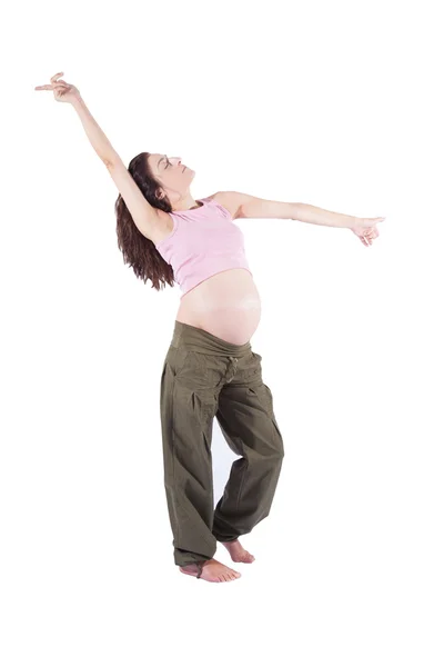 Pregnant woman dancing isolated — Stock Photo, Image