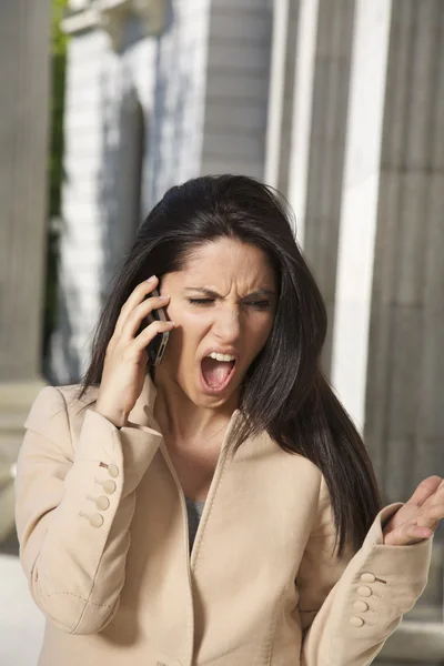 Angry businesswoman shouting phone — Stock Photo, Image