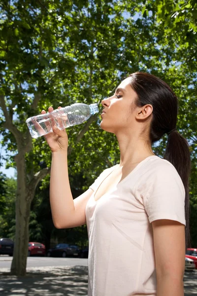 Woman profile drinking water — Stock Photo, Image