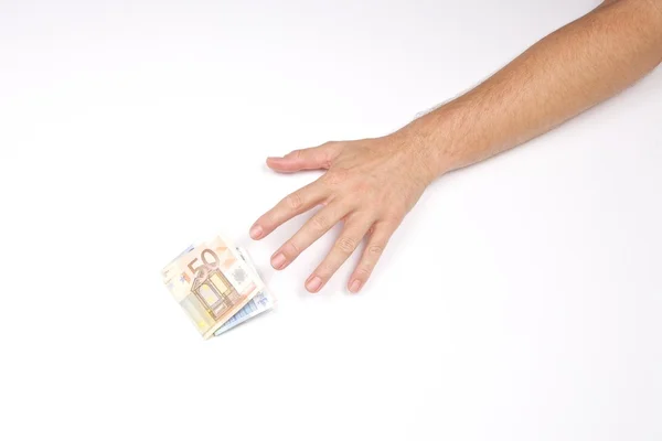 Hand and wad of euros — Stock Photo, Image