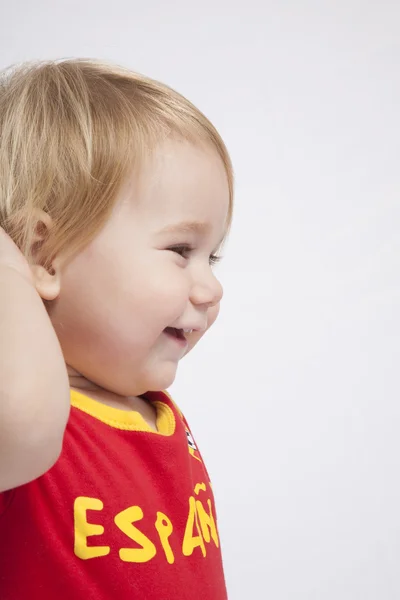 Sidan ansikte baby spansk fotboll fan — Stockfoto