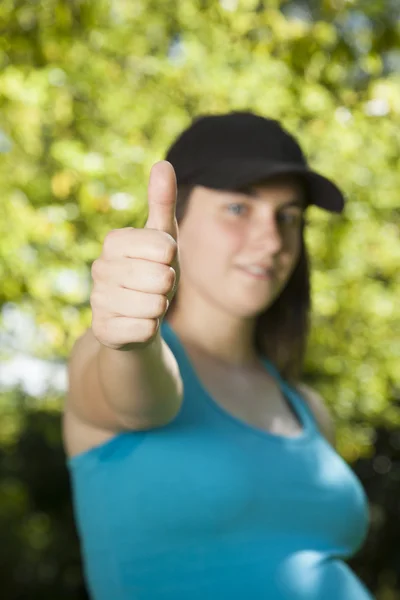 Thumb up young woman — Stock Photo, Image