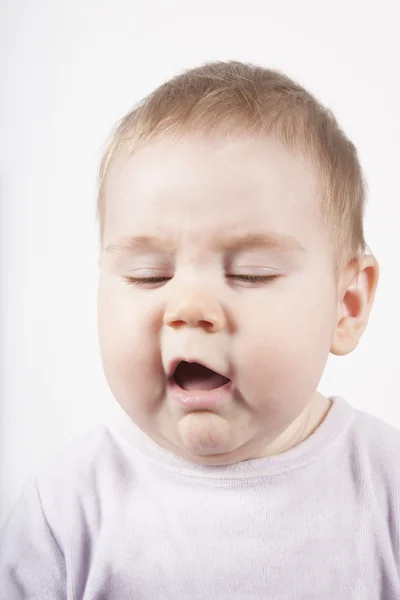 Disgusted or sneeze face baby — Stock Photo, Image