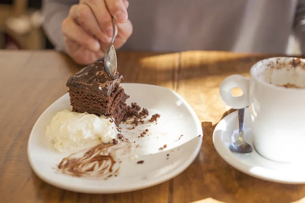 Taking chocolate cake — Stock Photo, Image