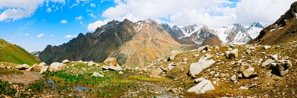 Panorama view on Tien shan peaks and mountains near Almaty. Dram