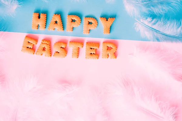 Happy Easter background, lettering from biscuits — Stock Photo, Image