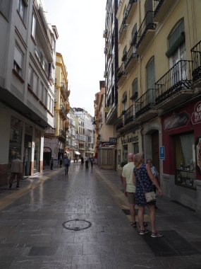 Narrow street view in Malaga city in Spain - vertical
