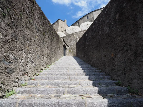 Medieval stairs of castel grande in european Bellinzona city in canton Ticino in Switzerland, clear blue sky in 2017 warm sunny summer day on July