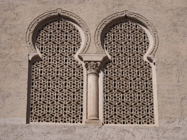 Medieval bifora window of palace in european Saragossa city at Aragon district in Spain in 2019 warm sunny summer day on September.
