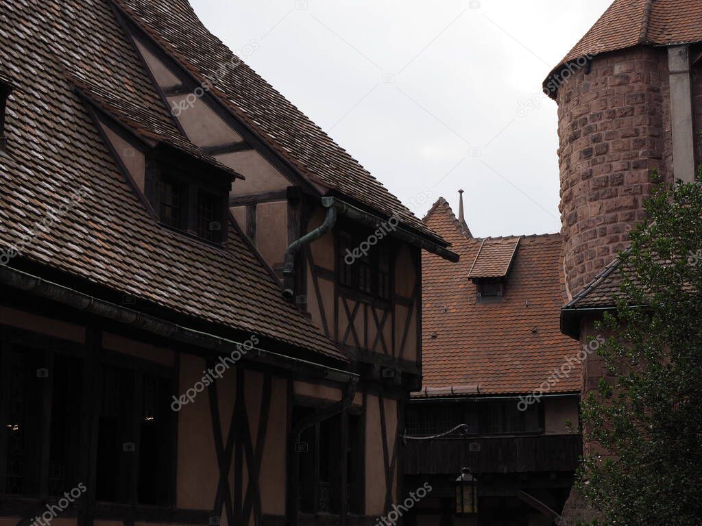 Courtyard of Koenigsbourg castle in european Orschwiller town of Alsace region in France with cloudy sky in 2018 warm summer day on August