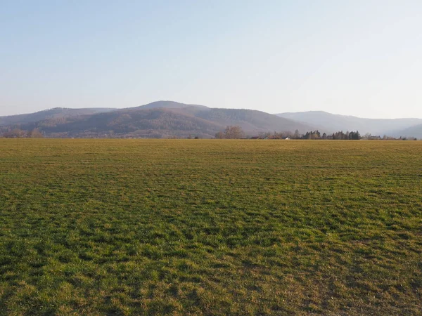 Desolate Silesian Beskid Mountains range in european Bielsko-Biala city in Poland, clear blue sky in 2020 warm sunny spring day on April.