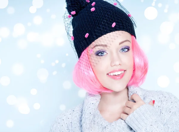Woman with pink hair wearing fancy winter hat — Stock Photo, Image