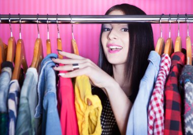 Surprised woman searching for clothing clipart