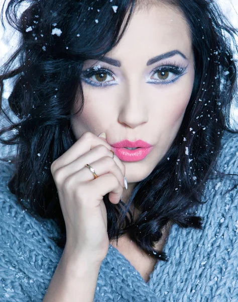 Woman covered with snow flakes — Stock Photo, Image