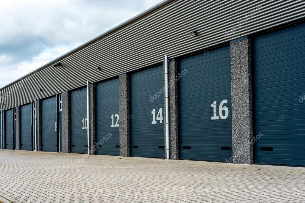 Unit storage warehouse facility with numberd doors Stock Photo by ...