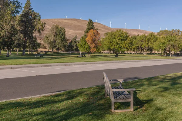 Maryhill museum parking lot and landscape overlooking wind turbines on a hill Washington state.
