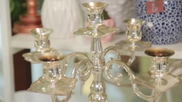 Shiny beautiful candlesticks in the store. — Stock Video