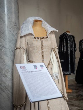 Cremona, Italy November 19th 2025 Elaborate Renaissance noblewoman dress from the Sforza court on a mannequin, part of a historical costume exhibition