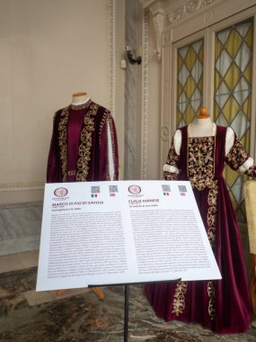 Cremona, Italy November 19th 2025 Renaissance fashion costumes of Marco Pio di Savoia and Clelia Farnese on display, representing medieval noble clothing and history