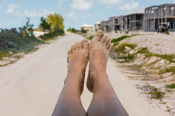 A picture of tourist's feet in front of  a pathway — Stockfoto