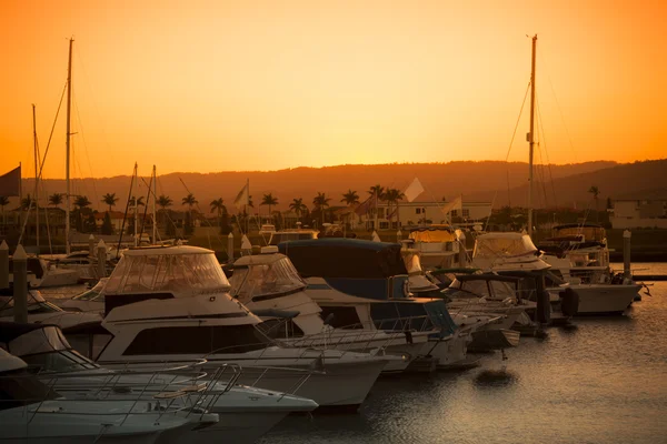 Luxurious yachts docked at the pier — Stock Photo, Image