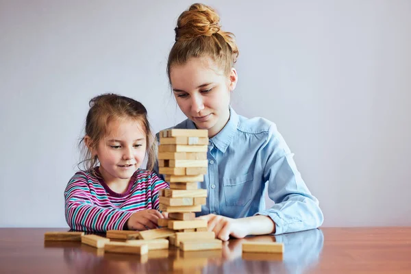 Little Girl Preschooler Her Elder Sister Playing Together Wooden Blocks — Stock Photo, Image