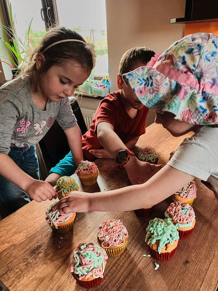 Group Children Baking Cupcakes Preparing Ingredients Topping Sprinkles Decorating Cookies Royalty Free Stock Photos