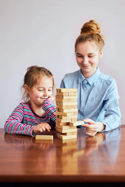 Little Girl Preschooler Her Elder Sister Playing Together Wooden Blocks — Stock Photo, Image