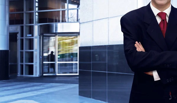 Businessman and bank office building — Stock Photo, Image