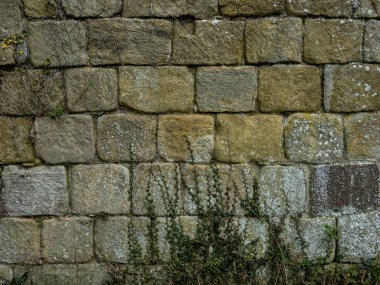 Tarihi kireçtaşı duvar dokusu eski taş duvar yüzeyini gösteriyor