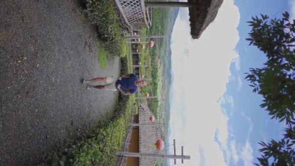 Man Tourist Walking Yun Lai Viewpoint Vertical Portrait Orientation Handheld Video Clip