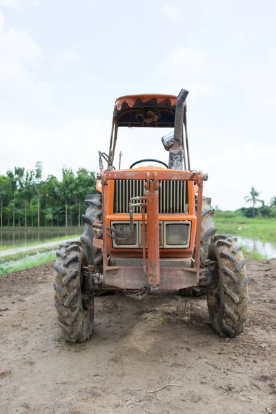 Tractor in a rice field — Stock Photo, Image