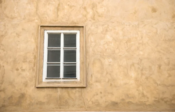 Window on yellow wall — Stock Photo, Image